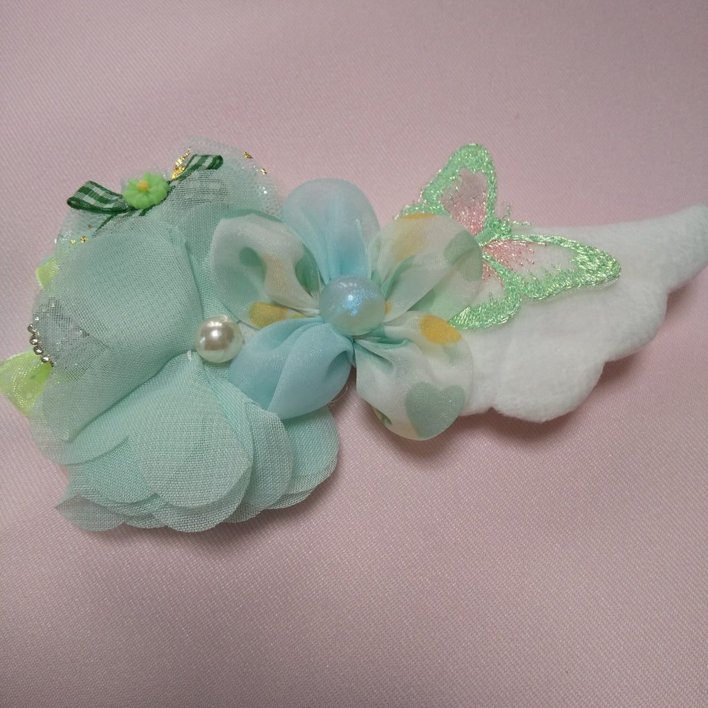 <35059>Flower hair clip with wings (yellow green)