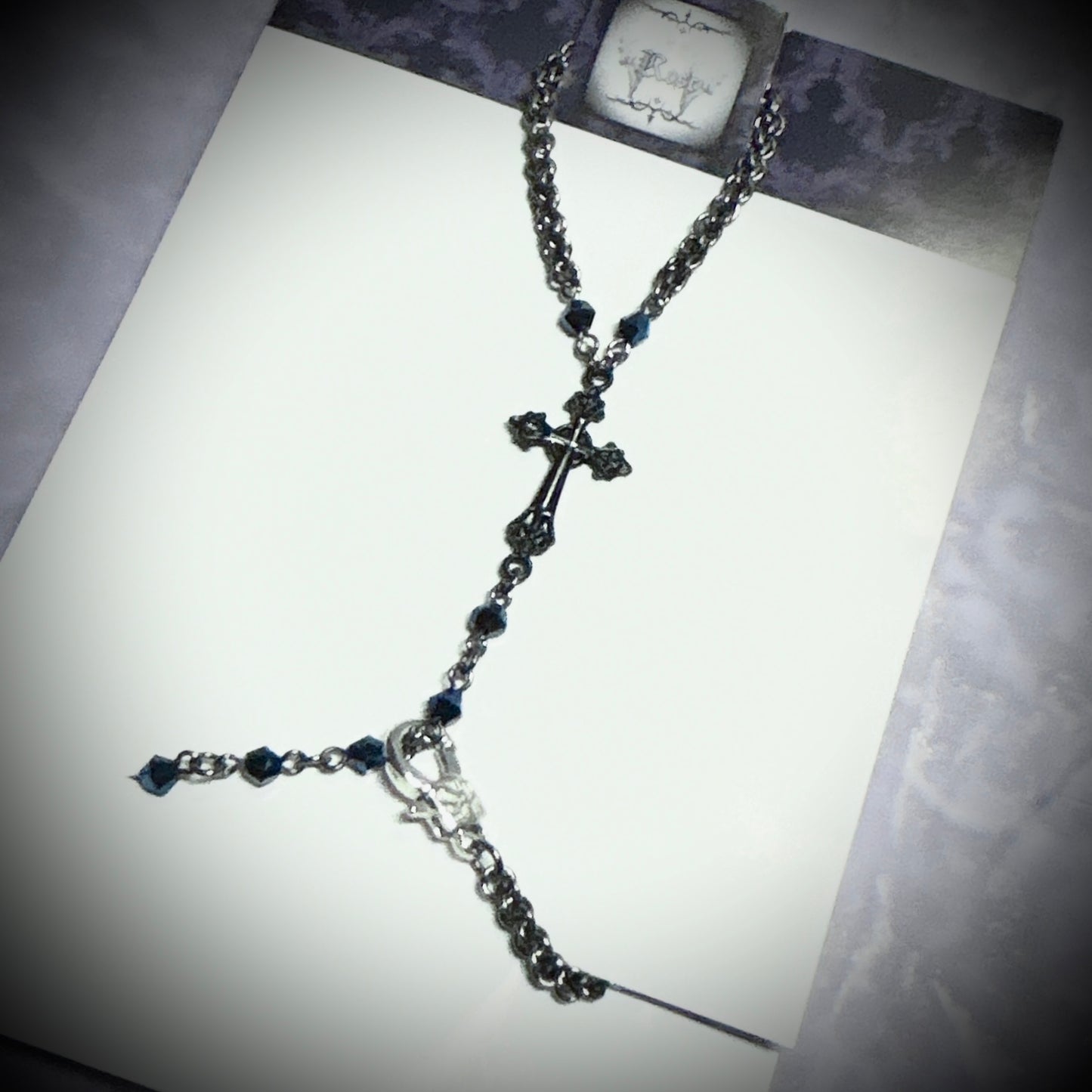 <01049>hand chain/black cross